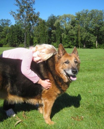 Willow, a little girl, and her 14-year-old dog Zoe