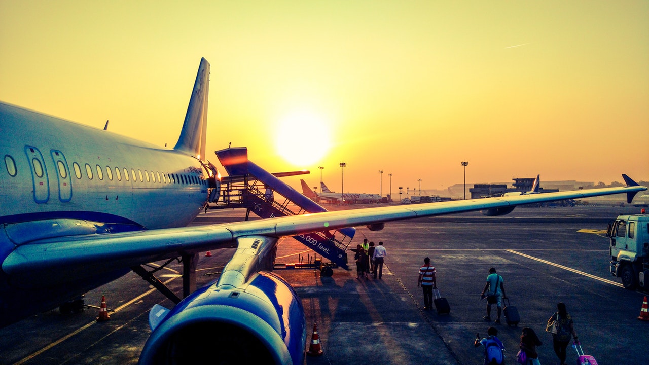 Passengers boarding large jet plane Passengers boarding large jet plane