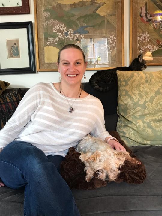 Dr. Sowers with a senior patient brunette woman with dog