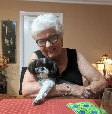 Lovely adopted by Carol older woman and dog