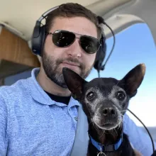 Pilot and Dog in Cockpit