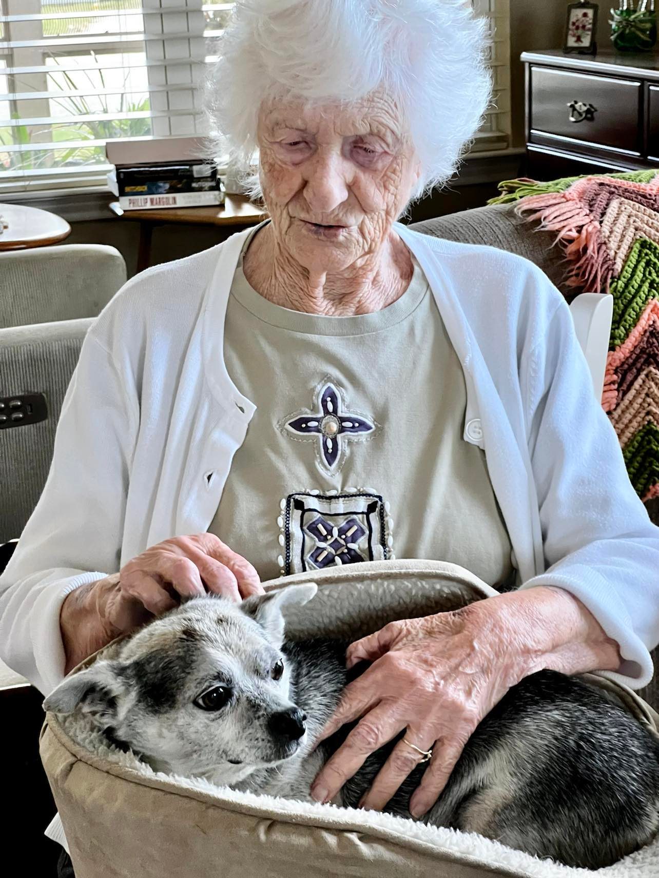 older woman and chihuahua